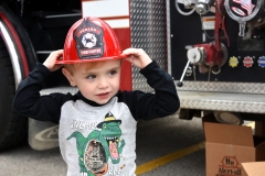 Jack-Morton-2-tries-out-.-Oxford-Fire-Department-gave-out-candy-and-firehats-from-one-of-its-trucks.