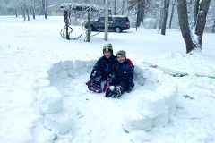 02-01-23-snow-Eli-and-Zach-Hickmott-making-an-igloo