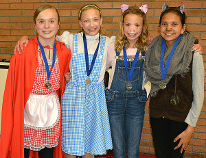 Winning first place at the 2016 Oxford Middle School Battle of the Books was the team “Once Upon a Timers.” Members included (from left) Kayla Casper, Lauren Schiller, Natalie Schiller and Gargi Ramekar. Photo by C.J. Carnacchio.