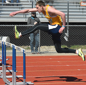 Oxford’s Tanner Saxton  exhibits fantastic form as he leaps over a hurdle.