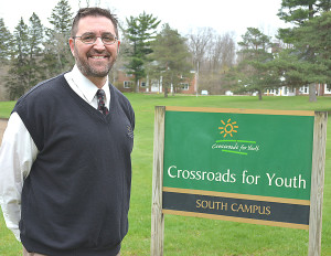 After 15 years with Crossroads for Youth, Marc Porter has been named president of the agency. He and his family will live on the 320-acre campus in Oxford. Photo by C.J. Carnacchio.