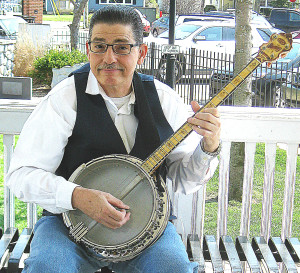 Ernie May, of Oxford, and his trusty banjo. Photo by  Elise Shire.