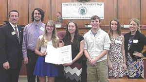 From left: Oakland County Commissioner Michael Spisz with Oxford High School students Gregory Marshall, Makayla Marshall, Tabitha Sterner, Noah Szymanski, Olivia Upham and teacher Lauren Jasinski. These students received certificates recognizing them for participating with the 36th Annual Youth in Government Day Program. Photo by Julia Ruffin.