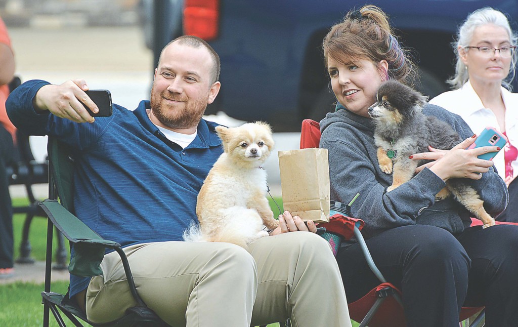 Oxford resident David Weingartz takes a selfie during the concert with his wife Taylor and their pomeranians Blossom (left) and Yogi. Photo by C.J. Carnacchio.