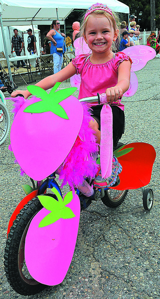 Colorfully-decorated bikes are all part of the parade fun.