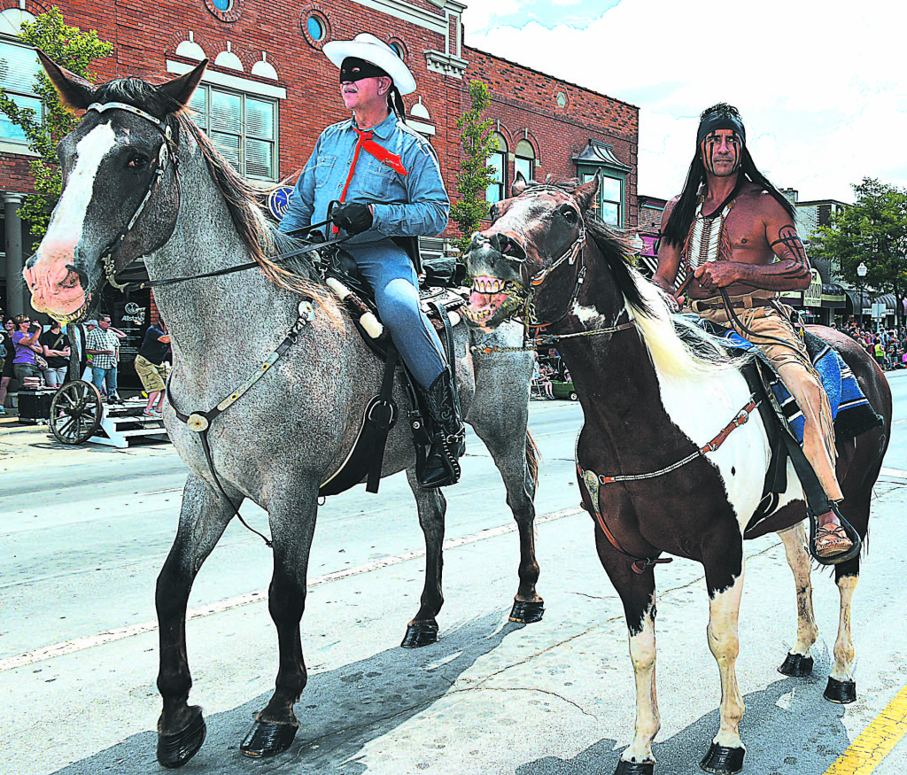 The biggest hit of the parade is always when the Lone Ranger and Tonto appear to save the day!