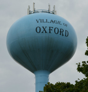 Oxford village is exploring the possibility of leasing space on top of its water tower for cellular antennas along with bottling and selling its excess groundwater.