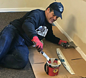 Doing a bit of painting is volunteer Eric Ibarra. Photo provided.