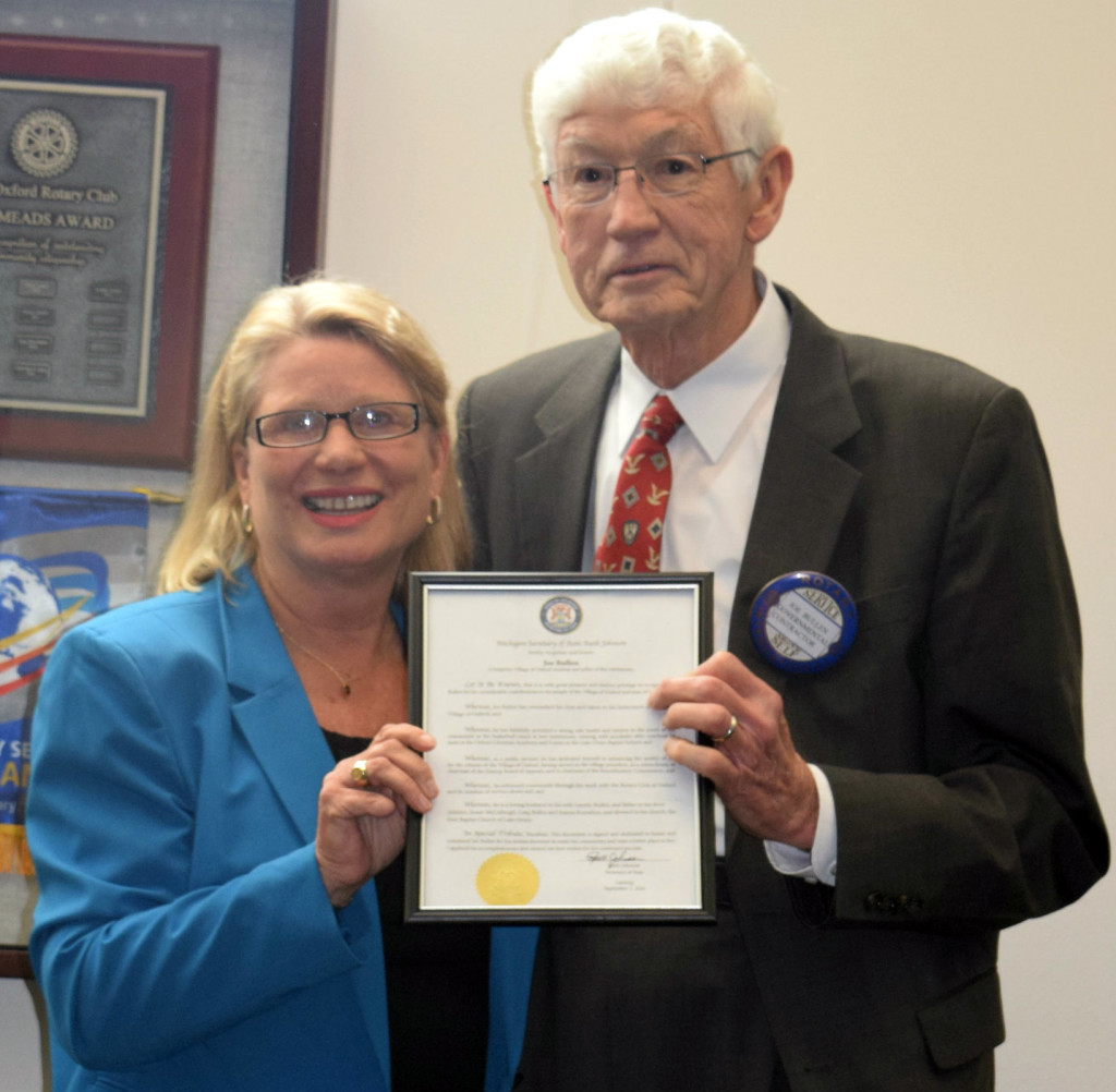 Secretary of State Ruth Johnson presented an award to Joe Bullen, longtime Oxford resident and Rotarian. Photo by Elise Shire.