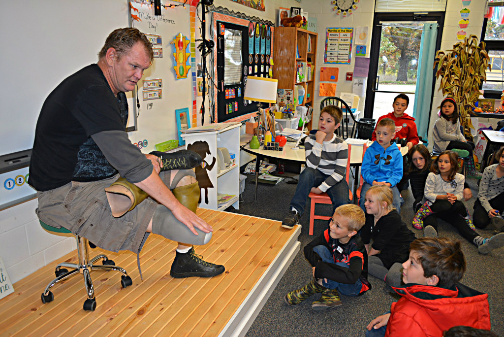 Britton residents Jeff Harig talks about being a double-amputee and a stuntman with a group of students at Kingsbury County Day School in Addison. Photo by C.J. Carnacchio.