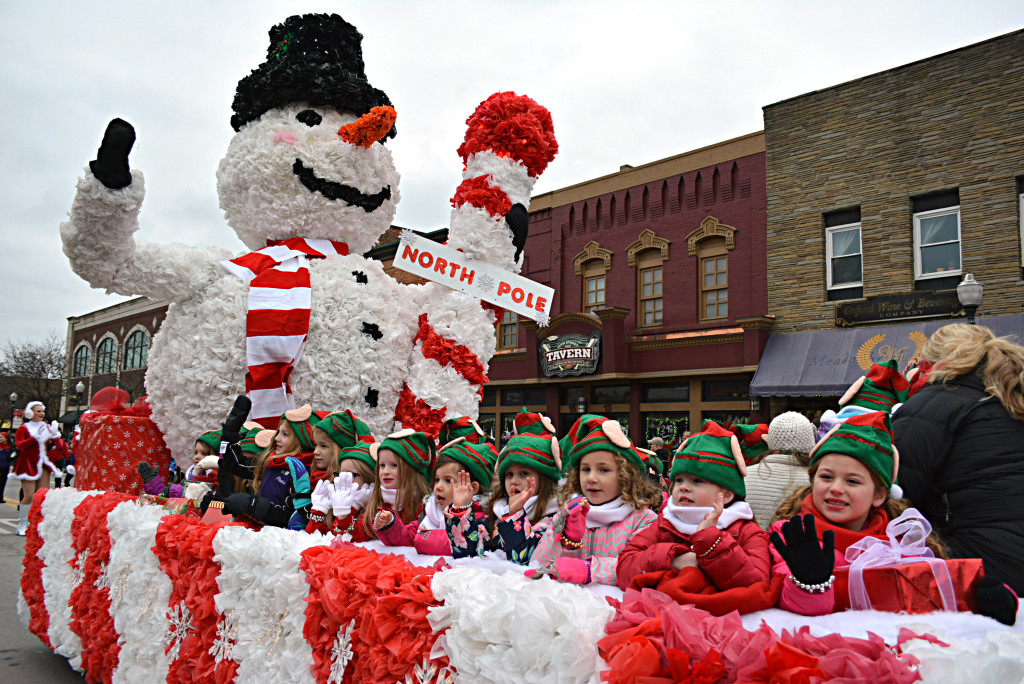 Nothing says "Christmas" like a giant snowman and a bunch of jolly little elves. The Center Stage Dance Company created this float. Photo by C.J. Carnacchio.