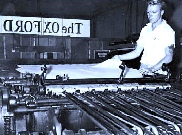 Hauxwell operating the old sheet-fed press used by Leader until the 1960s. He began working for the company in 1956.