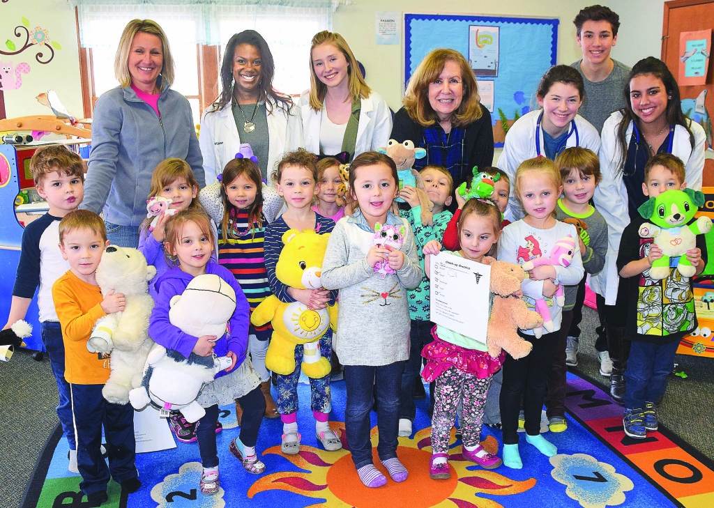 The “Toyologists” from Oxford High School visited Cindy Winther’s class at the Sunny Day Preschool on Flint Street to give the kids’ stuffed animals a checkup on Thursday. 