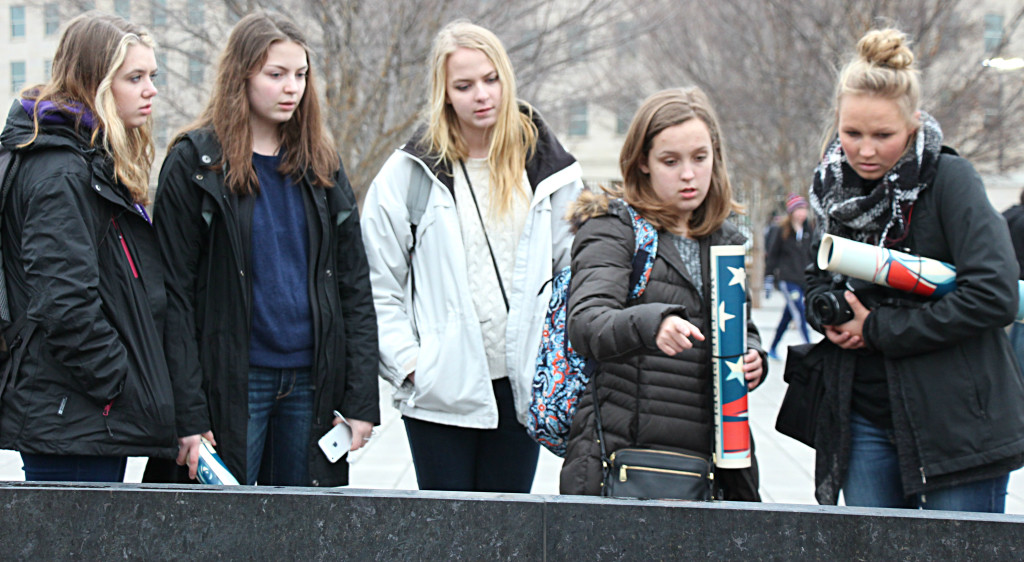 Lara Stromeyer, Elise Godfryd, Clare Godfryd, Kate Brantley and Brooke Hebb pay their respects outside of the Pentagon’s 9/11 memorial. Photo by Olivia Upham.