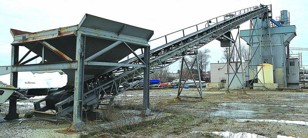 The old Oxford Concrete plant, located in Oxford Village’s industrial area along S. Glaspie St., is going to be demolished this week. It’s been a fixture since the 1970s. Photo by C.J. Carnacchio.