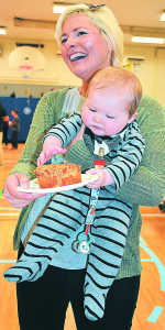 This May 12, 2016 photo snapped at the “Muffins for Moms” event at Leonard Elementary earned Editor C.J. Carnacchio second place in the Feature Photo category of the MPA’s 2016 Better Newspaper Contest.