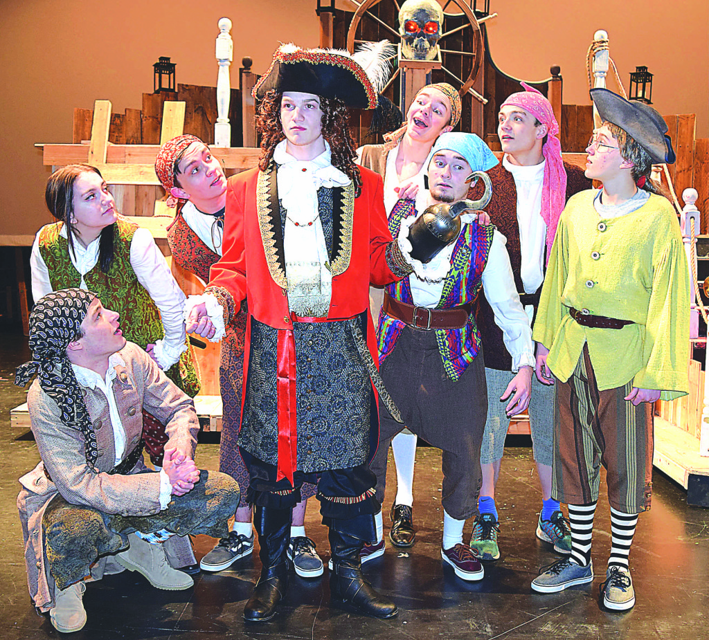Captain Hook played by Josh Krol (center) and fellow pirates (from left) Drake Skikiewicz (front left), Charity Garner, Ian Malinowski, Andrew Wassell (back), Jacob Donovan (front), Trenton Sabo (back) and Skylar Ryskamp (far right). Photo by Elise Shire.