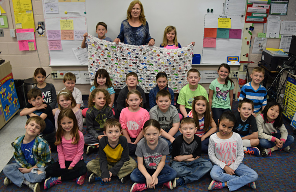 Daniel Axford Elementary teacher Renee Green’s second-grade class used recycled plastic bags to help make sleeping mats for homeless people. Photo by Elise Shire.