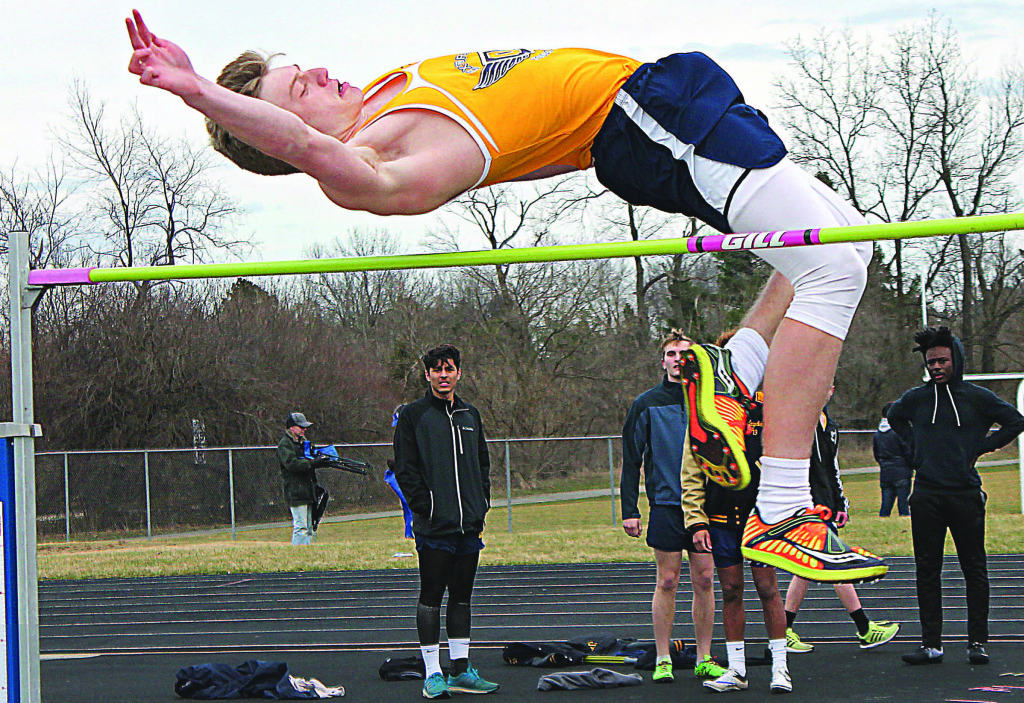 OHS junior Parker Fleming placed first in the high jump in the first dual track and field meet against Clarkston March 29. Photos by Heather Smith.