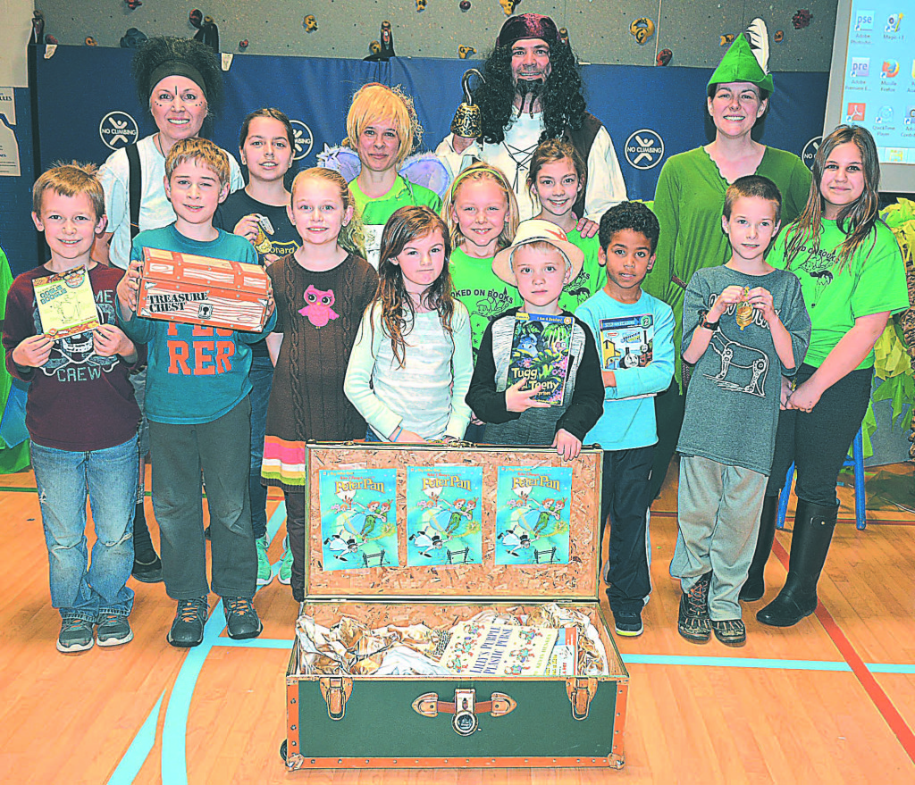 Leonard’s top student readers included (from left) Ethan Wardrop, Kevin Kindermann, Clementine Collison, Madeline Smith, Scott Burgess, Camden Ray, Gage Durst and Sami Jo Yocum. Behind them are (from left) Kathleen Gilbertson (Lost Boy), Kate Schweitzer, Lisa Wells (Tinker Bell), Keersten Geibel, Cali McDevitt, Sarah Ashley (Peter Pan) and Paul McDevitt (Captain Hook).