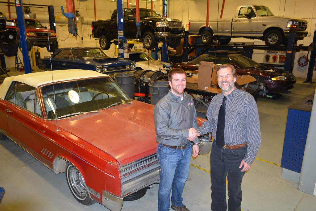 Mike Lawrence (left), a 2007 OHS graduate, has secured approximately $3,000 in shop supplies for OHS teacher Dan Balsley’s automotive technology program. Lawrence, who now works for Turn Key Automotive in Oxford, is a former student of Balsley’s and credits the teacher for his success.