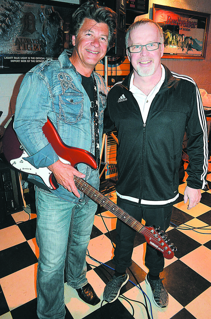 Mark Terrian (right) was grateful to Michael Young for putting on a fund-raiser for him.