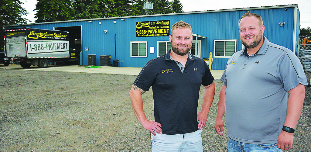 Oxford brothers Mark (left) and Ryan Austin, owners of Birmingham Sealcoat since 2006, now have their business headquartered in the town they’ve always called home. The  office is located at 2651 Metamora Rd. Photo by C.J. Carnacchio.