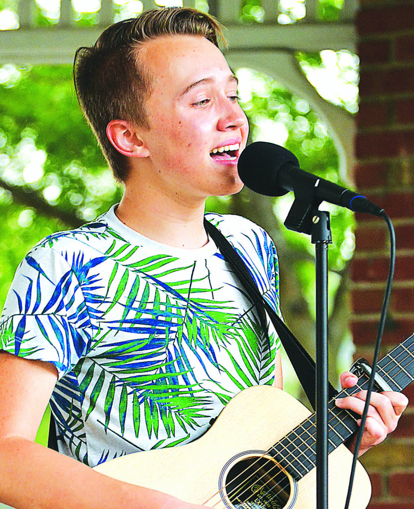 Skylar Ryskamp, who will begin his junior year at Oxford High this fall, played acoustic guitar and sang a variety of songs. Photo by C.J. Carnacchio.