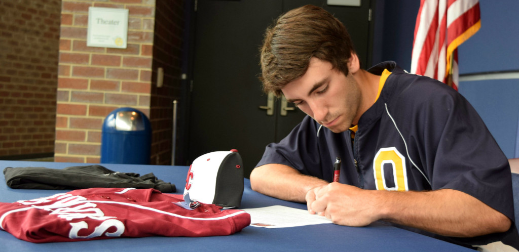 Mario Scribner, a 2017 OHS graduate, signed a letter of intent June 5 to play baseball for the Rochester College Warriors. Photo by Elise Shire.