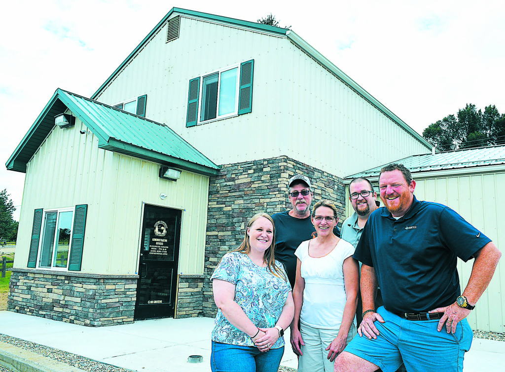 The staff of the Oxford Twp. Parks and Recreation Dept. is now conducting business from their new administrative offices in Seymour Lake Park. Pictured are (from left) Lauren Jacobsen, Jeff Kinasz, Dawn Medici, Dan Sullivan and Ron Davis. Photo by CJC.