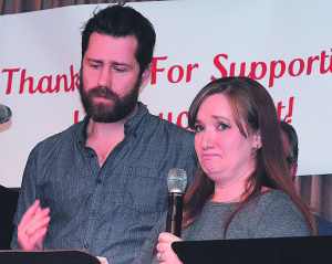 Oxford residents Bryan and Laura Holt share a very emotional moment as they thank the community for its support and generosity. Photos by C.J. Carnacchio.