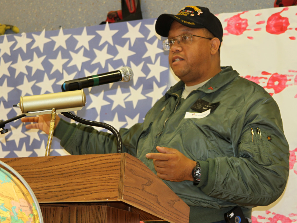 Retired Staff Sgt. J.D. Branch, who spent 24 years serving in the U.S. Air Force, gave an impromptu speech to students, teachers and fellow veterans during Leonard Elementary’s Veterans Day celebration on Nov. 10. Photo by C.J. Carnacchio.