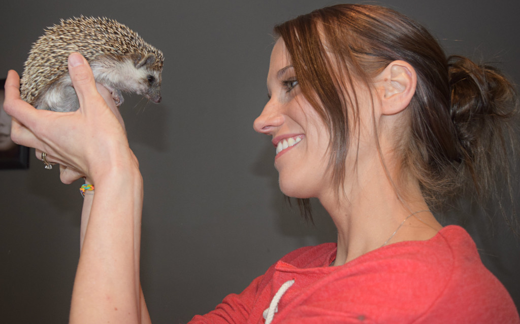 Oxford resident Ashley Ganey poses with Fallon, one of her 65 hedgehogs. Photo by Elise Shire.
