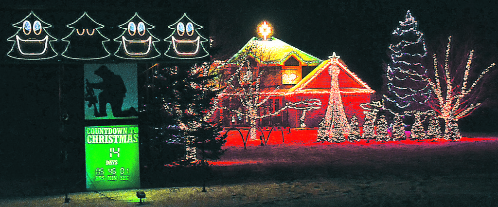 The Hickmott home at 190 Amy Lynn Dr. in Metamora Township will be aglow with a nightly Christmas light show set to music until Jan. 1.