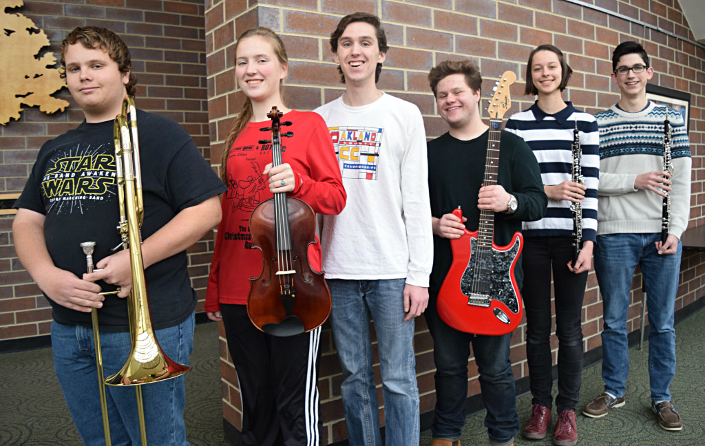 Tyler Dulinski (left) Nadia Smith, Zachariah Smith, Luke Sittard and Hayden Franke  perform with some of the state’s top student musicians in Grand Rapids on Jan. 27. Selina Langfeldt (second to right) received an honorable mention. Photo by Elise Shire.