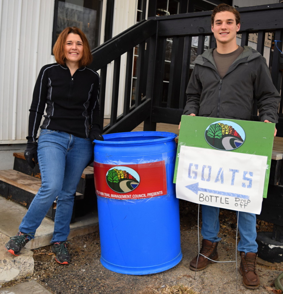 Polly Ann Trail Manager Linda Moran (left) and Sam Urban, a fifth-year Oxford Schools Early College student, are asking folks to donate their returnable bottles and cans to help pay for goats that munch on invasive plants. Photo by Elise Shire.