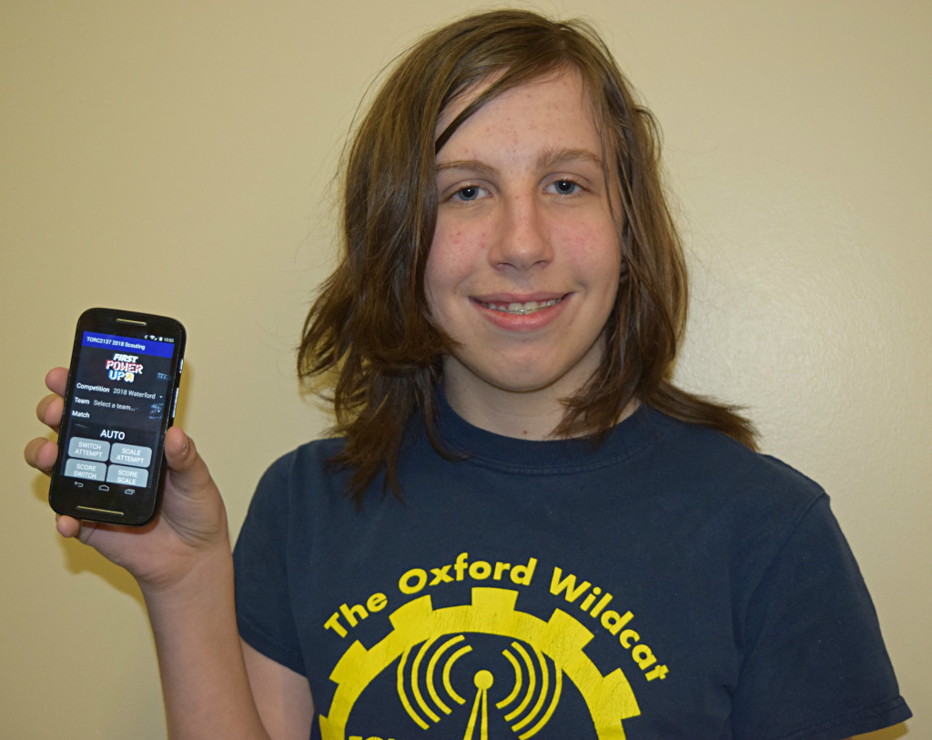 OMS eighth-grader Andrew Haselton created an app to monitor  competitors’ robots. Photo by Elise Shire.