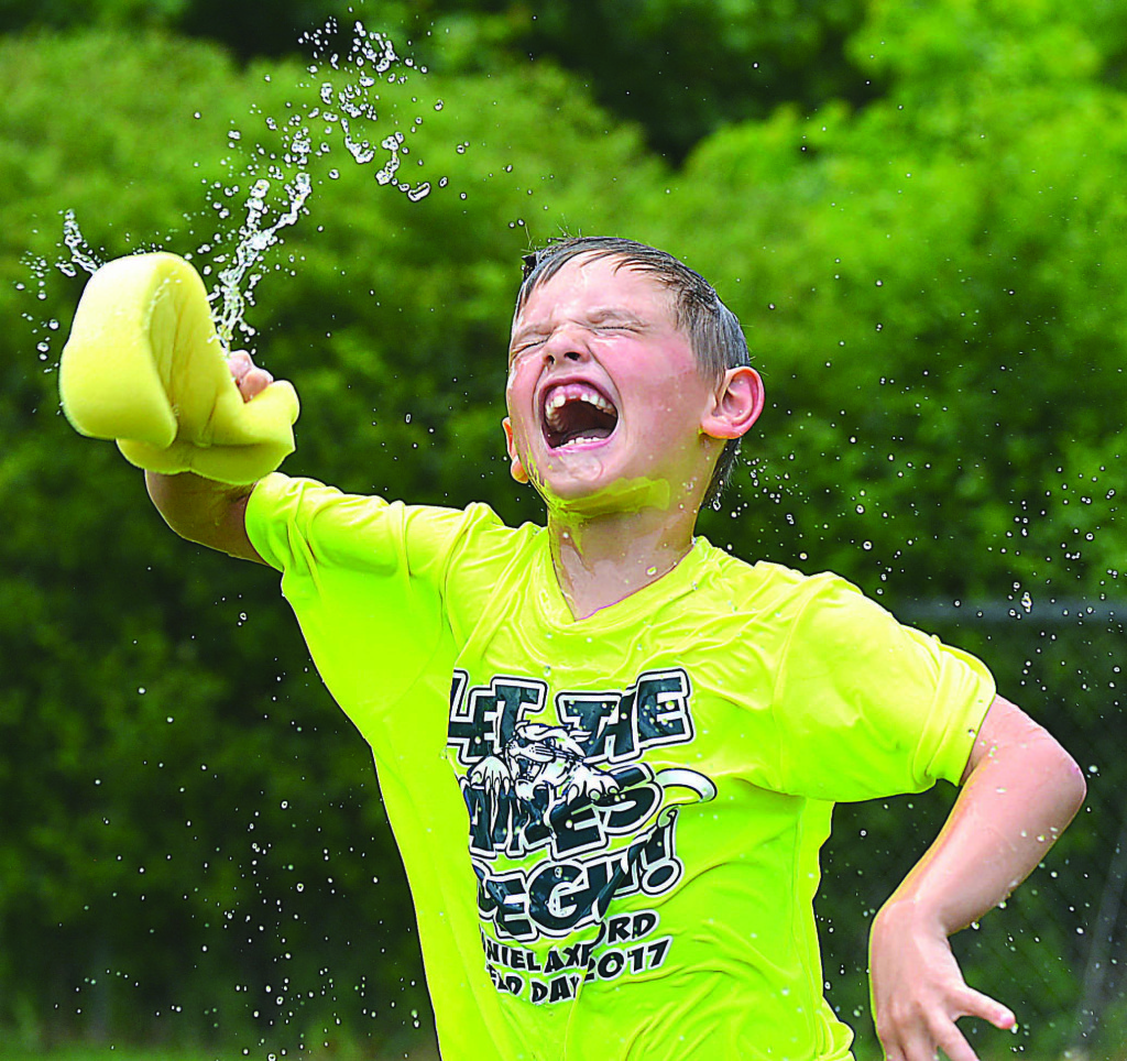 Leader Editor C.J. Carnacchio’s June 21, 2017 photo of Daniel Axford Elementary student Vance Stipanovich having a great time during the school’s annual Field Day earned an award from the SPJ.