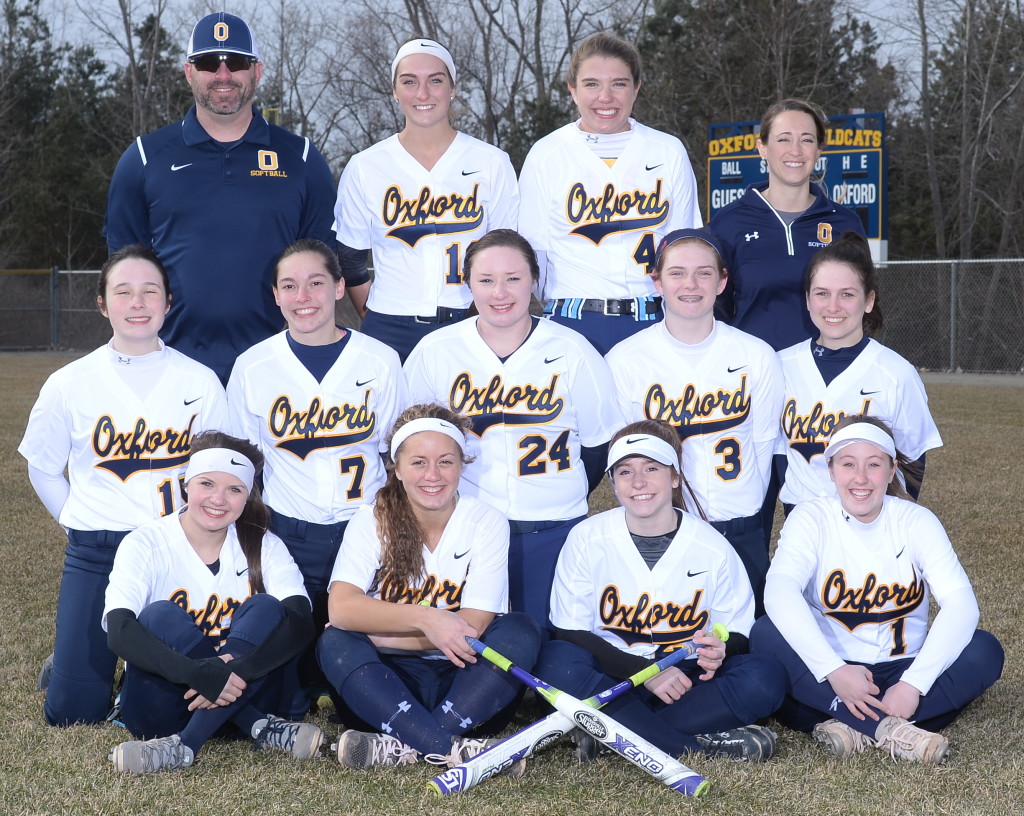 The Oxford High School varsity softball team consists of Head Coach Kenny Allen (back row, from left) Hannah Vachon, Sarah Campbell and Assistant Coach Megan Dray. Shown in the middle row are Emma Morris, Kaitlyn Bean, Lauren Donaldson, Caroline Marsh and Mackenzie Miller. Meghan Lupu, Chloe Allen, Gabby Dinges, Sarah Tyrrell are shown in front. 