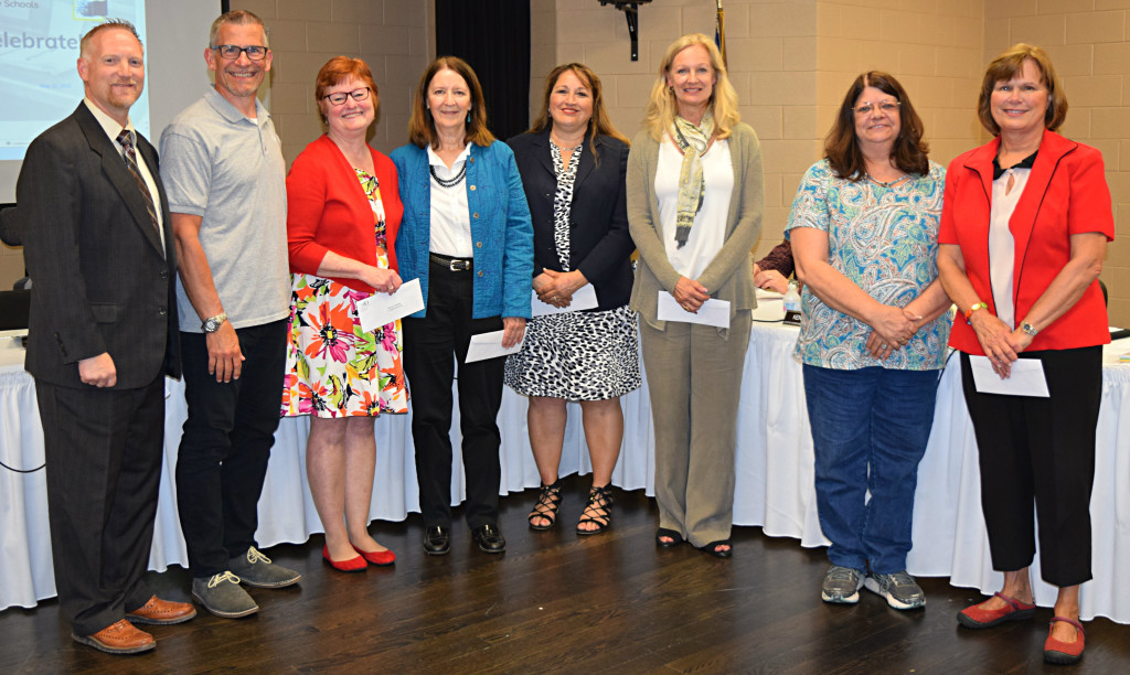 A total of 18 teachers and staff-members are retiring from Oxford Schools after providing years of dedicated service to the district. Superintendent Tim Throne (from left) and President Tom Donnelly pose with retirees Nancy Latowski, Pat Bono, Kim Kreilach Diane Lukas-Noe, Shelia Robertson and Jan Smith. Photo by Elise Shire.