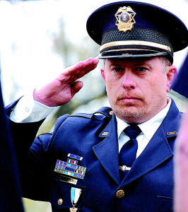 Oxford Village Police Chief Mike Solwold will salute the nation’s fallen in downtown’s Centennial Park on Monday, May 28.