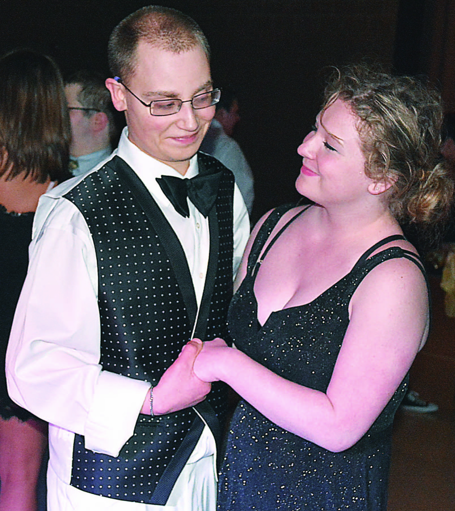 Noah Mathews, a special education student, shares a sweet moment while dancing with OHS student Aly Walters.  Photo by C.J. Carnacchio.