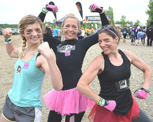 Oxford residents (from left) Katie Engelbert, Becky Rinke and Beth Lane took on the Tough Mudder obstacle course together Saturday.