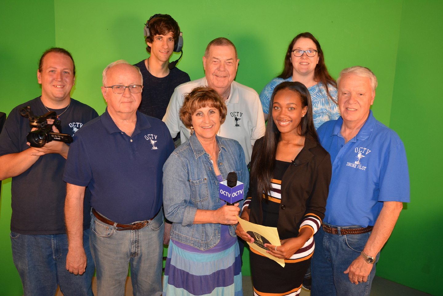 The staff of Oxford Community Television (OCTV) includes (from left) Russel Currier, Dave Kenny, Kyle Snage, Station Manager Bill Service, Production Manager Teri Stiles, Alexis Ware, Laurie Racz and Elgin Nichols. Photo by C.J. Carnacchio.