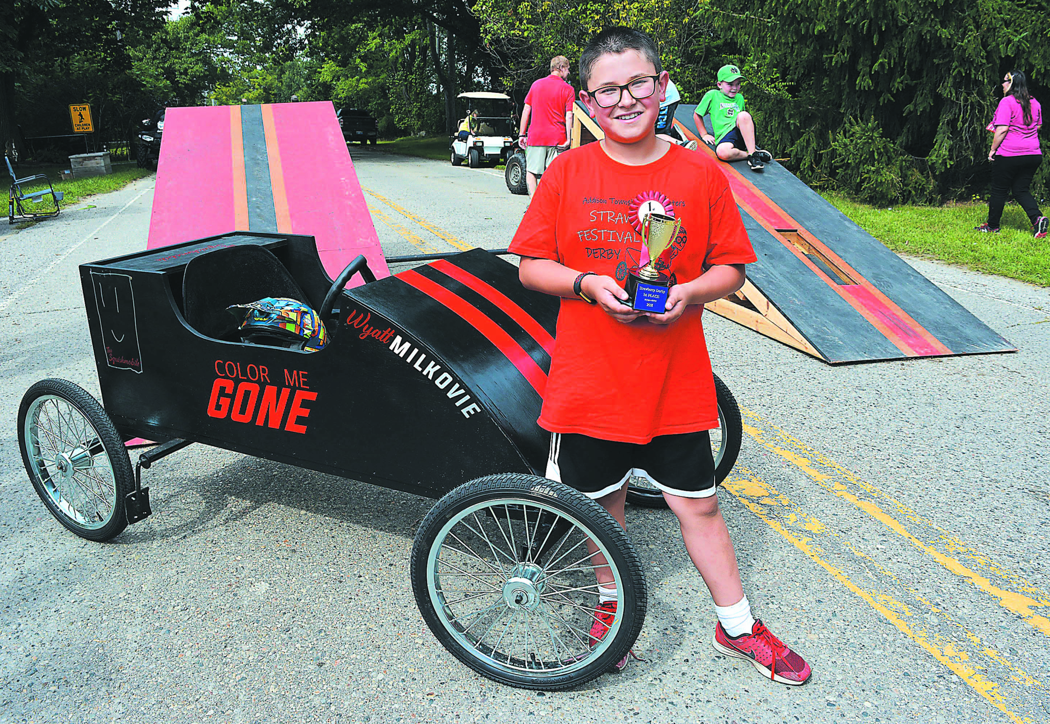Leonard Elementary fifth-grader Wyatt Milkovie won the Second Annual Strawberry Derby held Saturday morning in Leonard. He’s shown above with his soapbox racer “The Squishmobile.” Photo by C.J. Carnacchio.