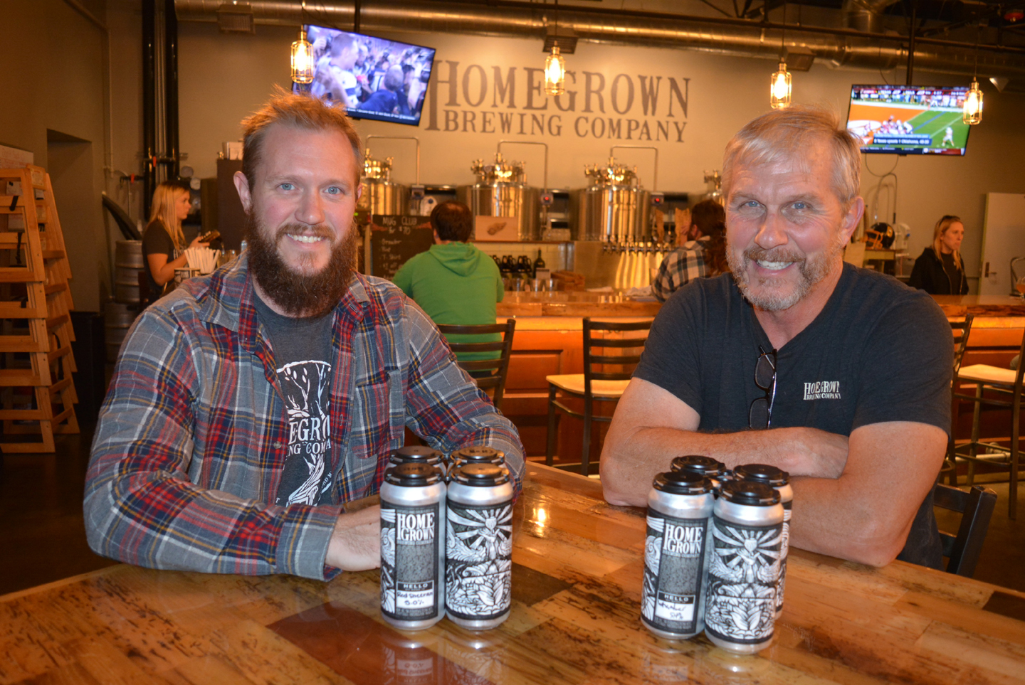 John Powers (right), co-owner of HomeGrown Brewing Company, and Head Brewer Joe Powers are excited to offer seven of their beers in four-packs of 16-ounce cans. Photo by C.J. Carnacchio.