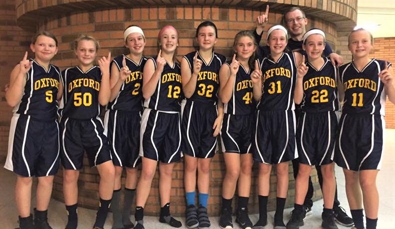 (From left) Kaya Coffman, Maddie Von Knorring, Paige Rushlow, Ella Boyd, Kitty Morris, Halena Knight, Bella Rushlow, Keira Billis and Maggie Casper. Head Coach Jake Trotter is shown in the back. Photo provided.