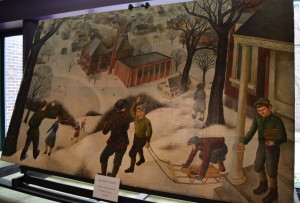 Artist Barbara Willson (1914-88) was commissioned under the Federal Art Project, part of the New Deal WPA, to paint murals depicting old Oxford. The former high school, known as the Washington Street School, is pictured in the background of this painting. Photo by C.J. Carnacchio. 