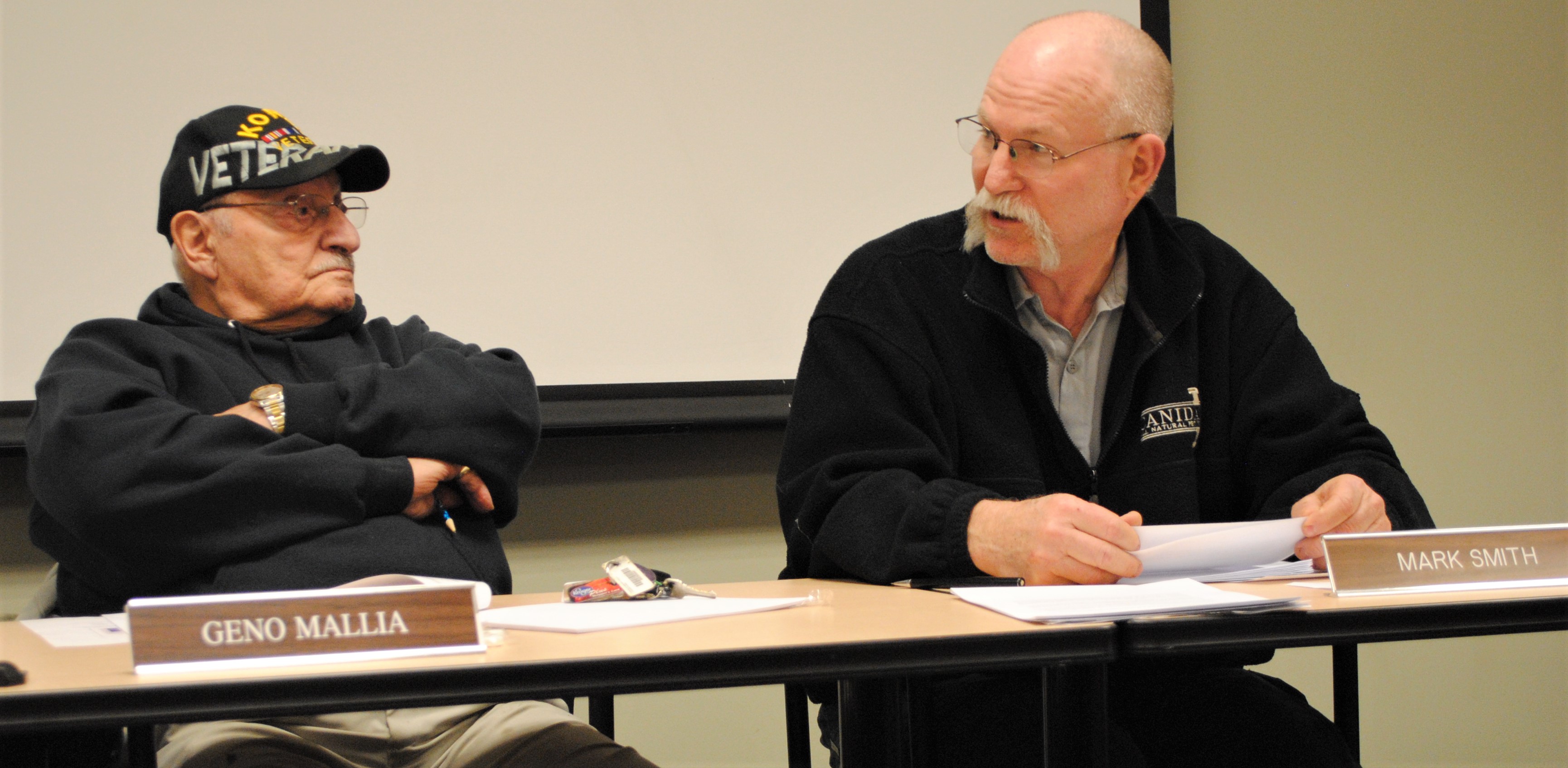 Longtime Fire Board members, Secretary Geno Mallia (left) and Chairman Mark Smith discuss dissolve the fire board. Photo by Shelby Tankersley. 