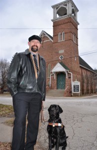Oxford resident Justin Willcock, shown with his guide dog Alex, is organizing a volunteer fair to be held April 13 at Immanuel Church. Photo by C.J. Carnacchio.